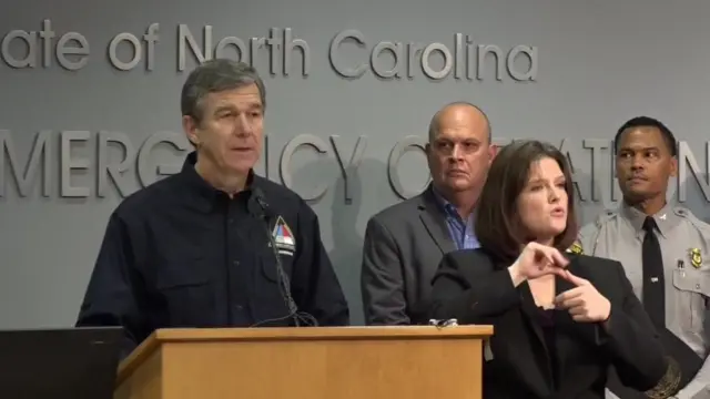 North Carolina governor Roy Cooper addresses a news conference