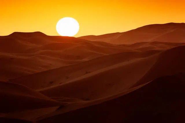 Sunrise in Morocco's Erg Chebbi.