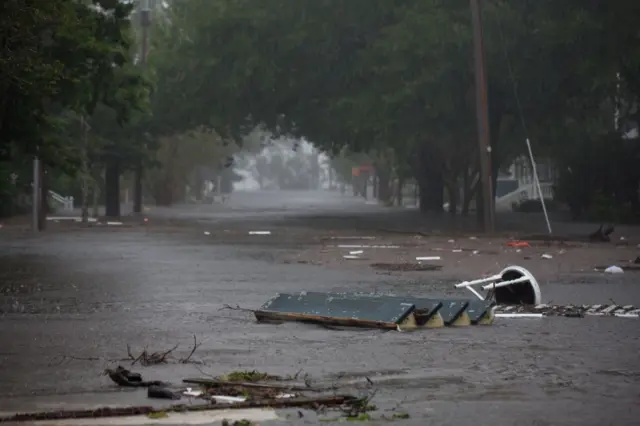 Furniture floating in flood