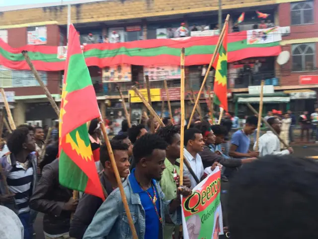 OLF supporters with banners