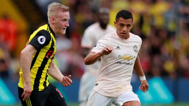 Manchester United's Alexis Sanchez in action with Watford's Will Hughes