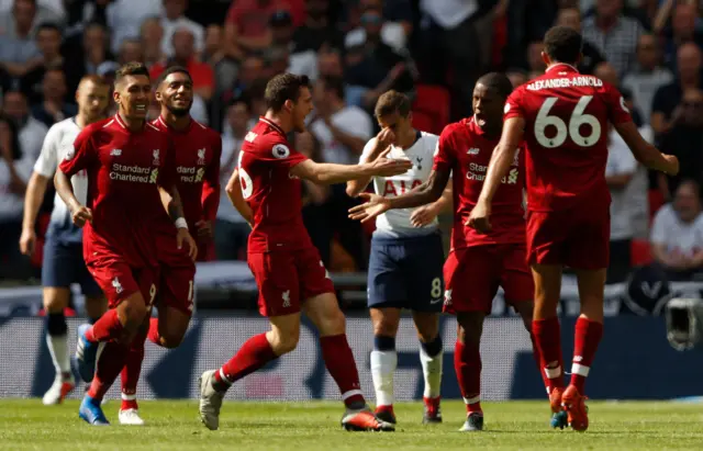 Georginio Wijnaldum celebrates