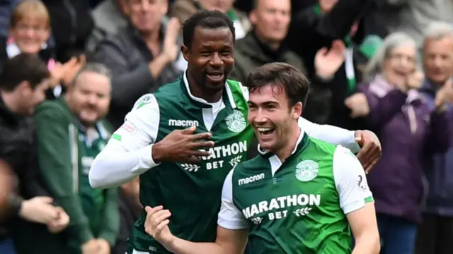 Stevie Mallan celebrates scoring