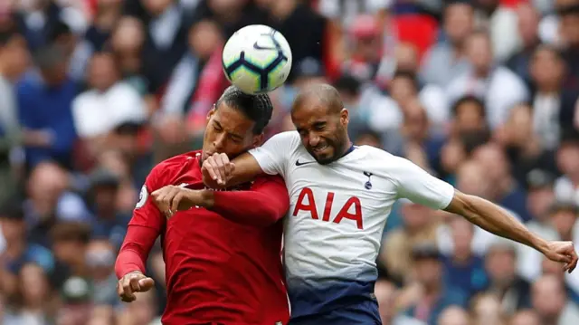 Liverpoo's Virgil van Dijk in action with Tottenha's Lucas Moura