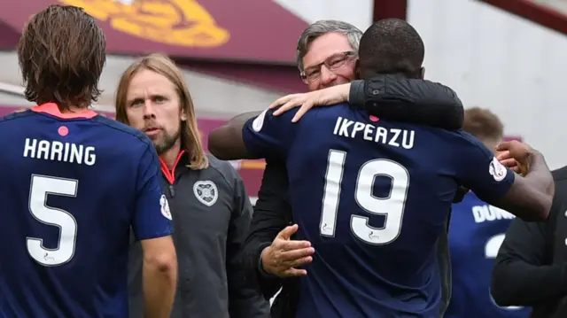 Craig Levein celebrates with Hearts players