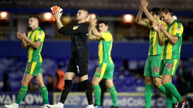 West Brom players clap their fans