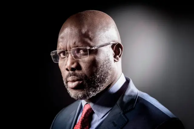 George Weah poses during a photo session on September 25, 2017 in Paris