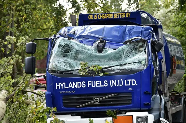 Lorry damaged by fallen trees during Storm Ali