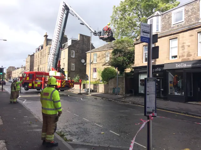 Firefighters on Perth Road Dundee. Masonry fallen from building.