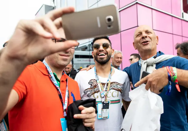 Sergio Aguero poses for a photo at Monza