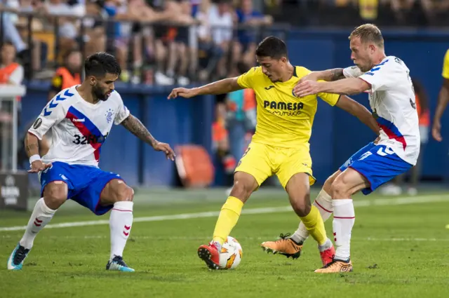 Daniel Candeias and Scott Arfield challenge Villarreal's Pablo Fornais (centre)