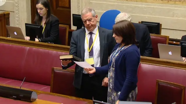 Jim Clarke taking the oath