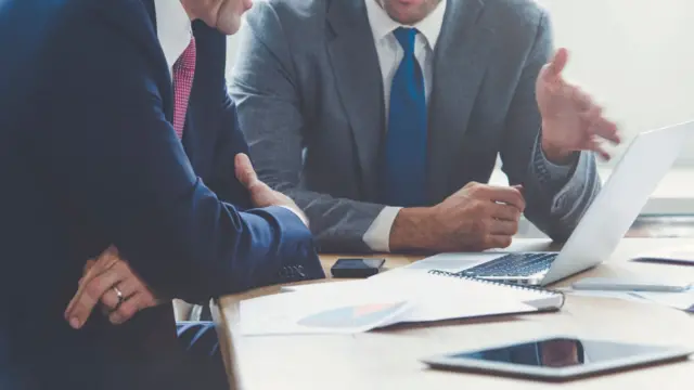 Two men in a meeting