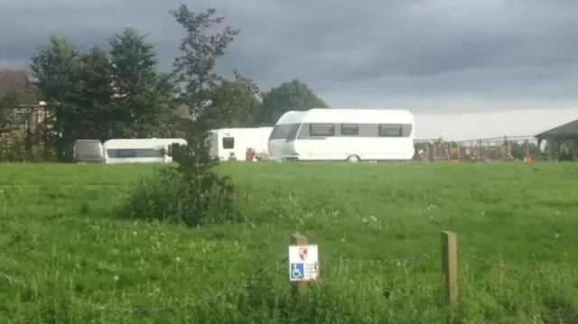 Travellers on the King George V playing fields in Exeter