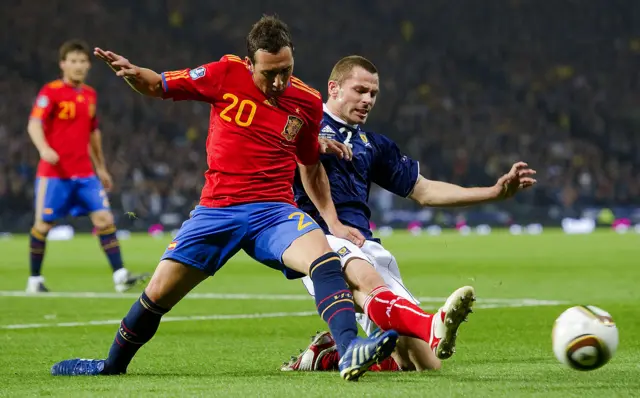 Santi Cazorla in action against Scotland at Hampden in 2010