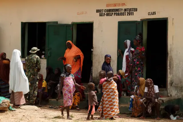 People outside help centre