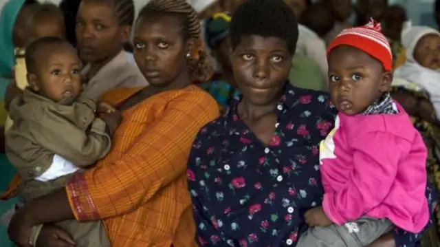 Women carrying children