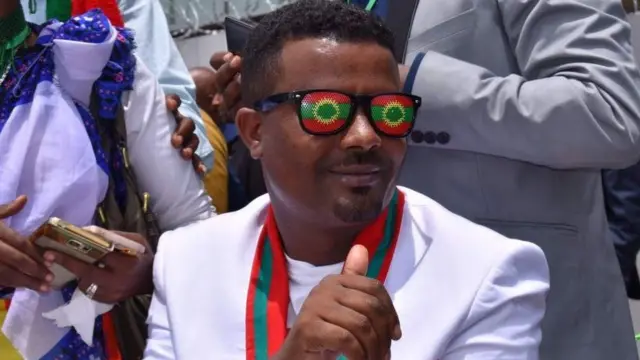 Ethiopian politician Kefiyalew Tefera celebrating the return of leaders of former rebel group -Oromo Liberation Front.