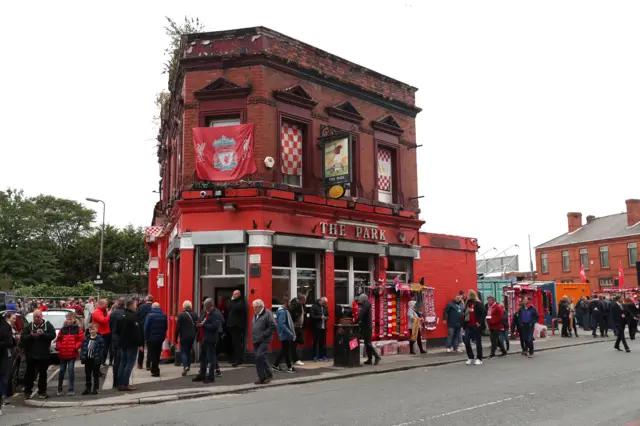 Liverpool supporters outside a pub