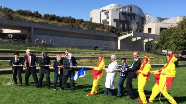 Protesters highlighted the issue of food standards in trade deals outside Holyrood while ministers discussed them inside