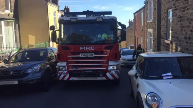 A fire engine and cars