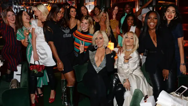 Bebe Rexha and Rita Ora (centre, front) and friends