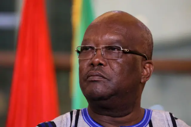 Burkina Faso's President Roch Marc Christian Kabore attends a ceremony welcoming the French President at the Presidential Palace in Ouagadougou, on November 28, 2017