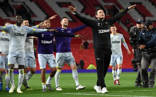 Derby County celebrate beating Manchester United