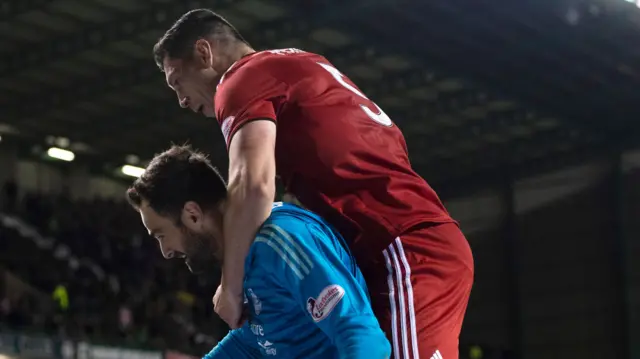 Joe Lewis and Scott McKenna celebrate Aberdeen's win over Hibs