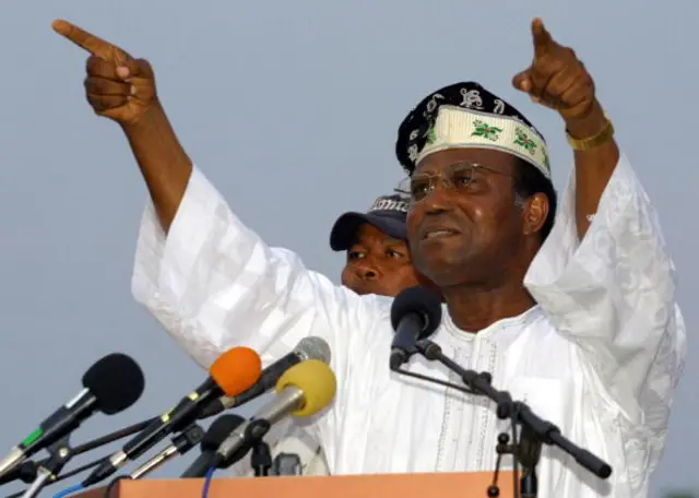 Former Benin President and former Mayor of Cotonou Nicephore Soglo waving to the crowd during his presidential campaign in Cotonou