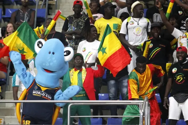 Crowd at basketball match