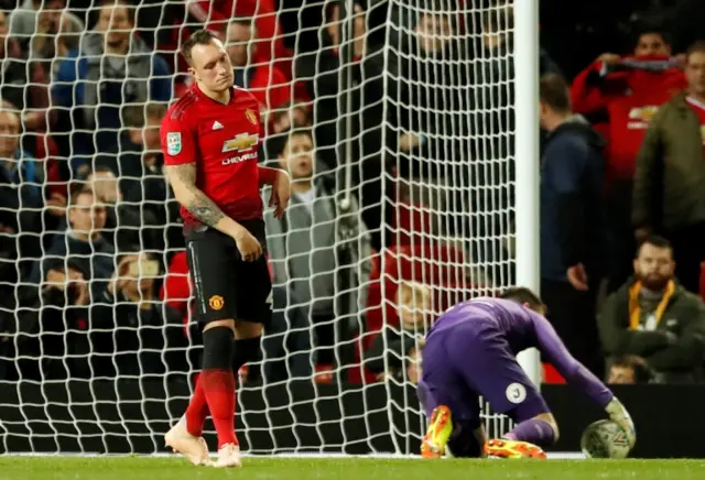 Phil Jones sees his penalty saved by Scott Carson