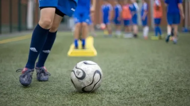 People playing football