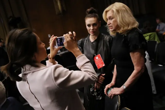 Rep. Carolyn Maloney (D-NY) (R) and actress and sexual assault survivor Alyssa Milano are interviewed in the hearing room where Christine Blasey Ford will testify