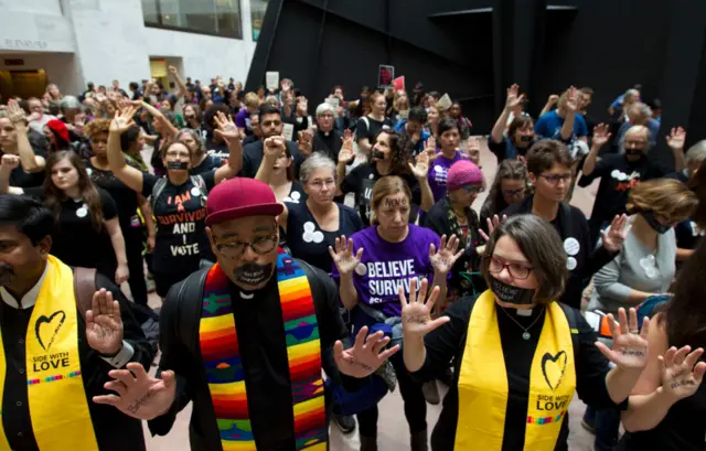 Protesters gather in the Hart Senate Office Building.