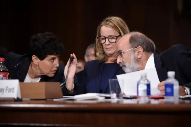 Ford and lawyers at hearing