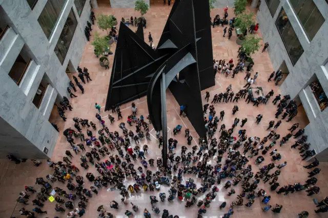 Protestors gather in the atrium of the Hart Senate Office Building to demonstrate against upreme Court nominee Judge Brett Kavanaugh on Capitol Hill.