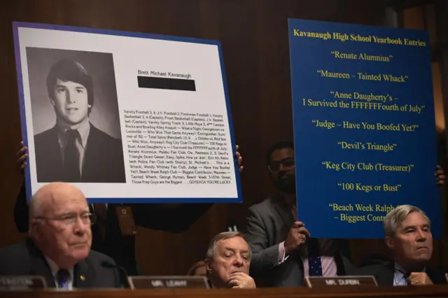 Extracts of his high school yearbook are displayed as Supreme Court nominee Brett Kavanaugh testifies before the US Senate Judiciary Committee.