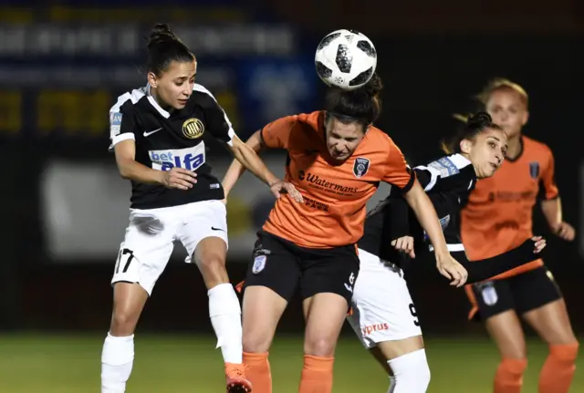 lasgow City's Leanne Crichton (centre) heads the ball away from Marilena Georgiou