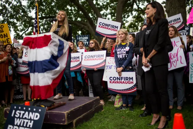 Demonstrators sing during a rally supporting Supreme Court Nominee Brett Kavanaugh.