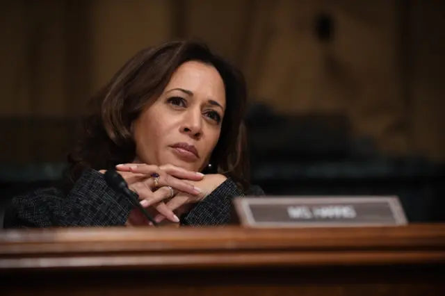 Kamala Harris listens to testimony