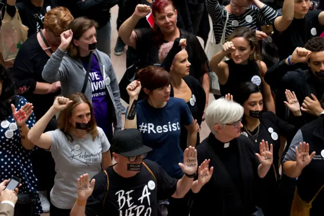 Pro-Ford supporters with raised hands