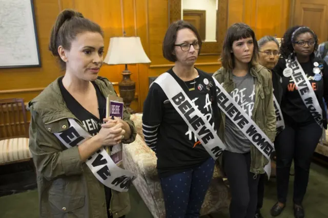 US actress Alyssa Milano (L) joins other protesters demonstrating against Supreme Court nominee Brett Kavanaugh at the office of Republican Senator from Mississippi Cindy Hyde-Smith