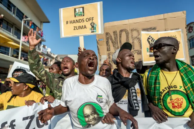 Supporters of the former South African president rally prior to his appearance in the KwaZulu-Natal High Court on corruption charges in Durban on April 6, 2018