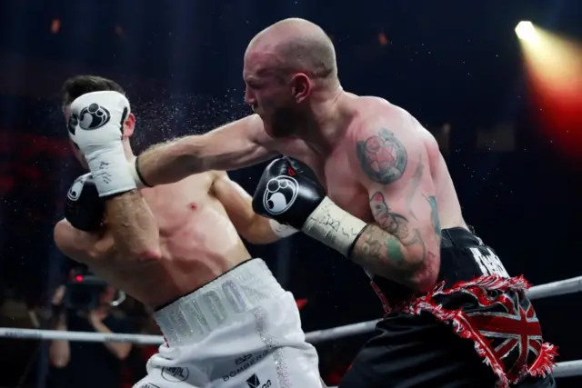 Groves punches Smith