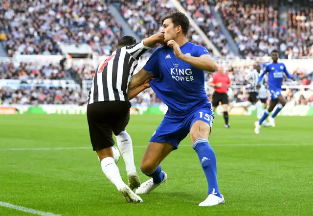 Harry Maguire and Ayoze Perez