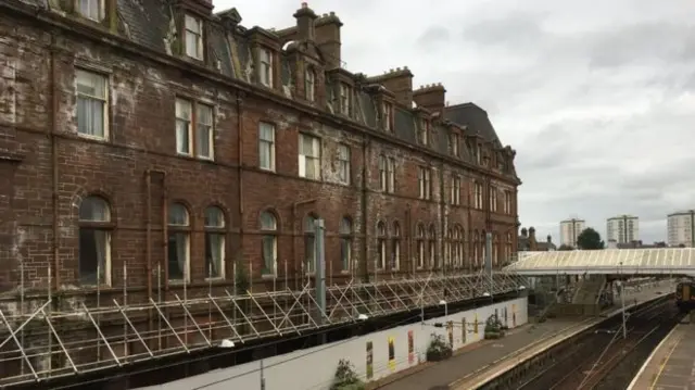 The former Station Hotel overlooks the platforms at Ayr Station