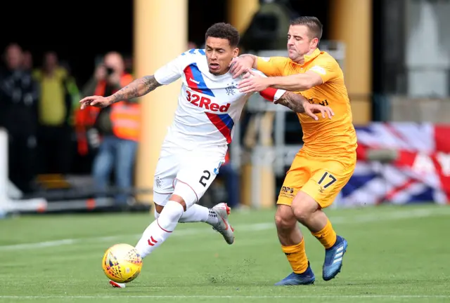 James Tavernier and Scott Robinson vie for possession