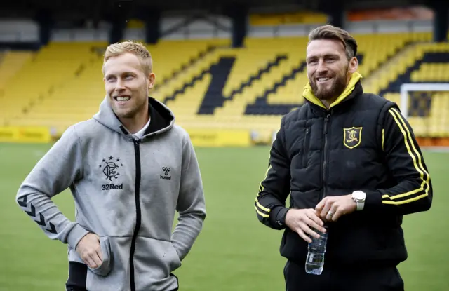 Rangers midfielder Scott Arfield and Livingston's Lee Miller