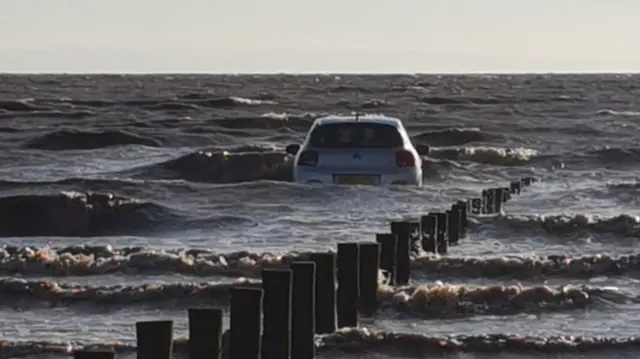 Car submerged in water